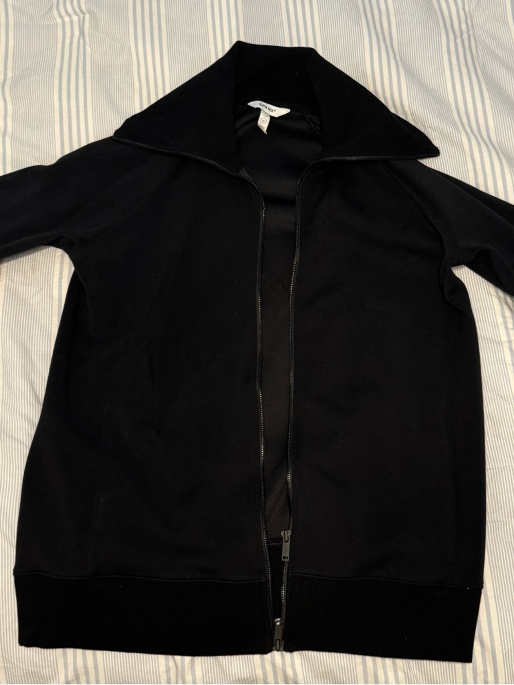 SPANX Black Garment with Branded Neck Tag